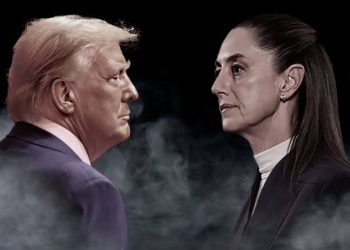 Two Adults in Suits Face Each Other in Profile Against a Smoky Dark Backdrop. - Hola Mty